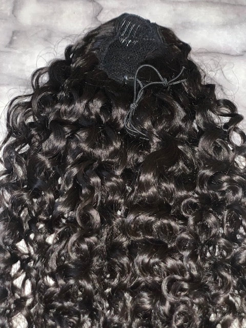 This is our peace (Indian curly- deep curly) ponytail in it's natural state and color. 